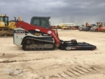 Side of used Track Loader in yard
